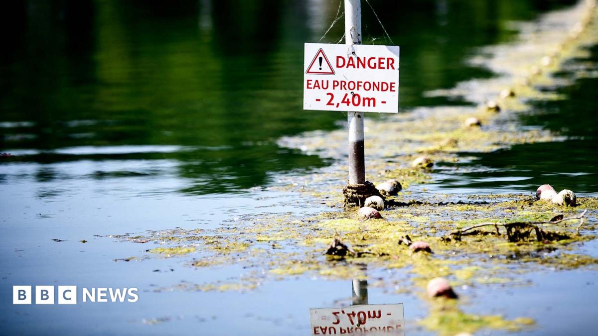 A river in France with a danger sign
