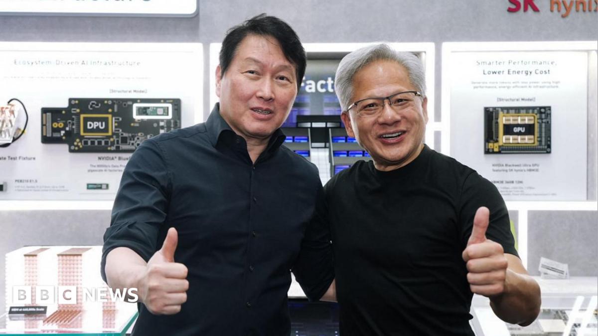 SK Hynix chairman Chey Tae-won and Nvidia boss Jensen Huang posing for a picture with their thumbs up