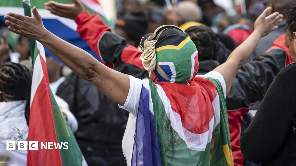 Protesters draped in South African flags in a rally against undocumented immigrants during a nationwide anti-immigration shutdown in Cape Town, South Africa, 30 June 2026.